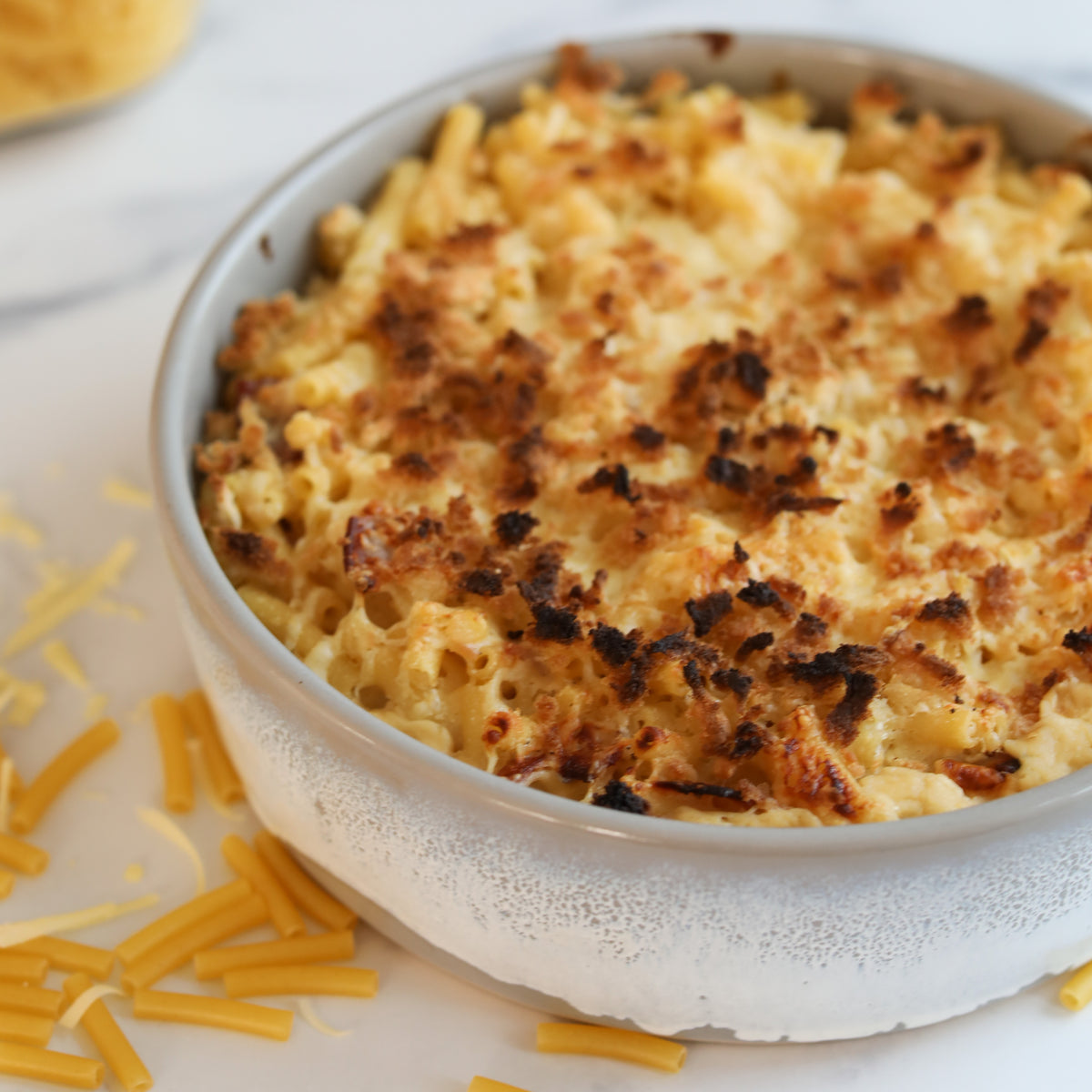 Mac and cheese in a large ceramic dish from Glosters