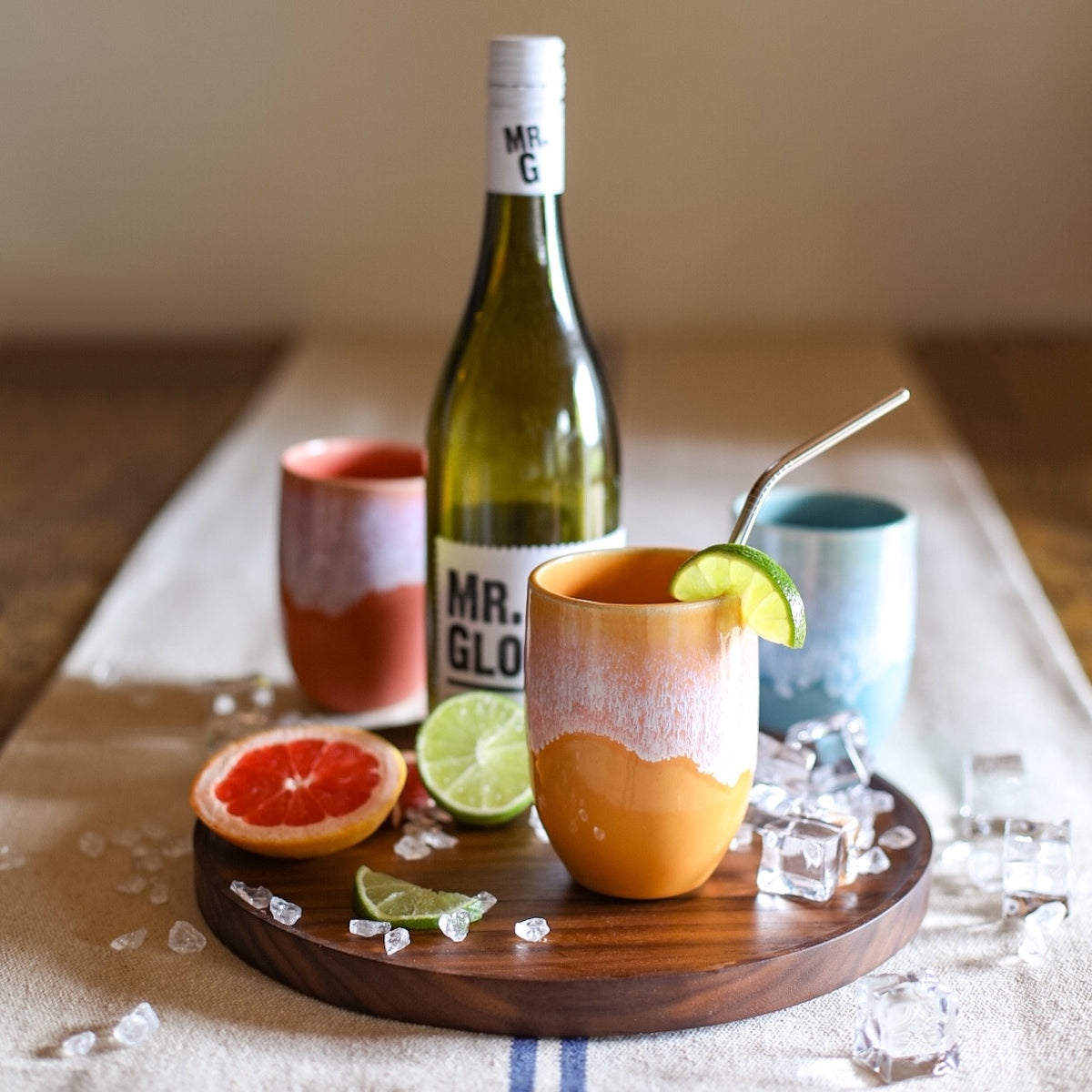 A colourful handmade stoneware drinks beaker from Glosters