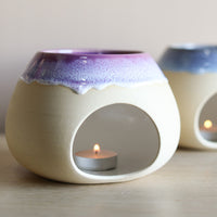 A wax melt burner made from ceramic by Glosters.