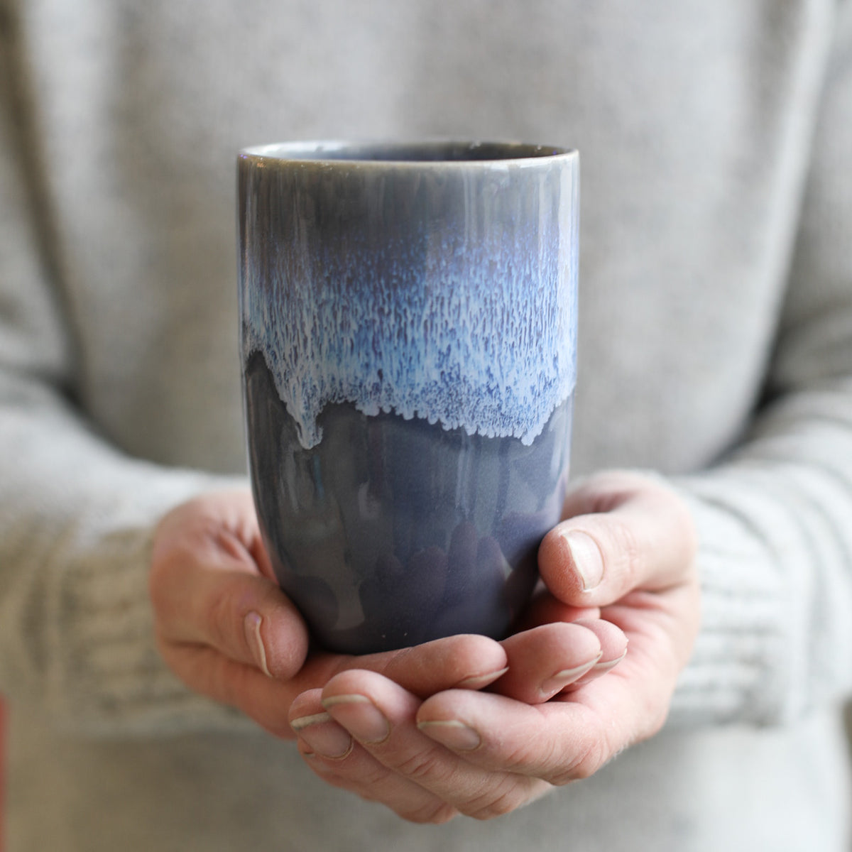 A colourful handmade stoneware drinks beaker from Glosters