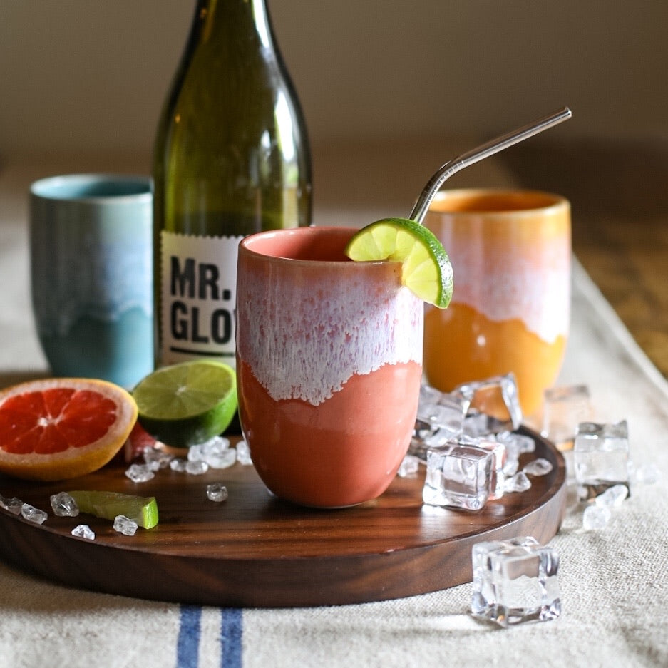 A colourful handmade stoneware drinks beaker from Glosters