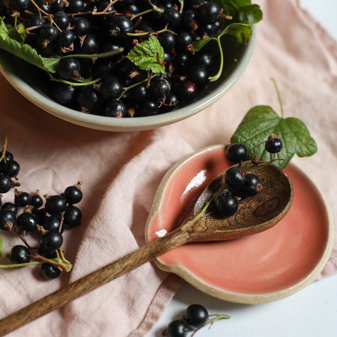 A handmade ceramic spoon rest from the Glosters pottery tableware collection.