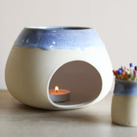 A wax melt burner made from ceramic by Glosters.