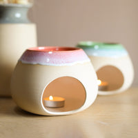 A wax melt burner made from ceramic by Glosters.