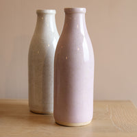 A large milk bottle vase from the Glosters pottery workshop in Wales.