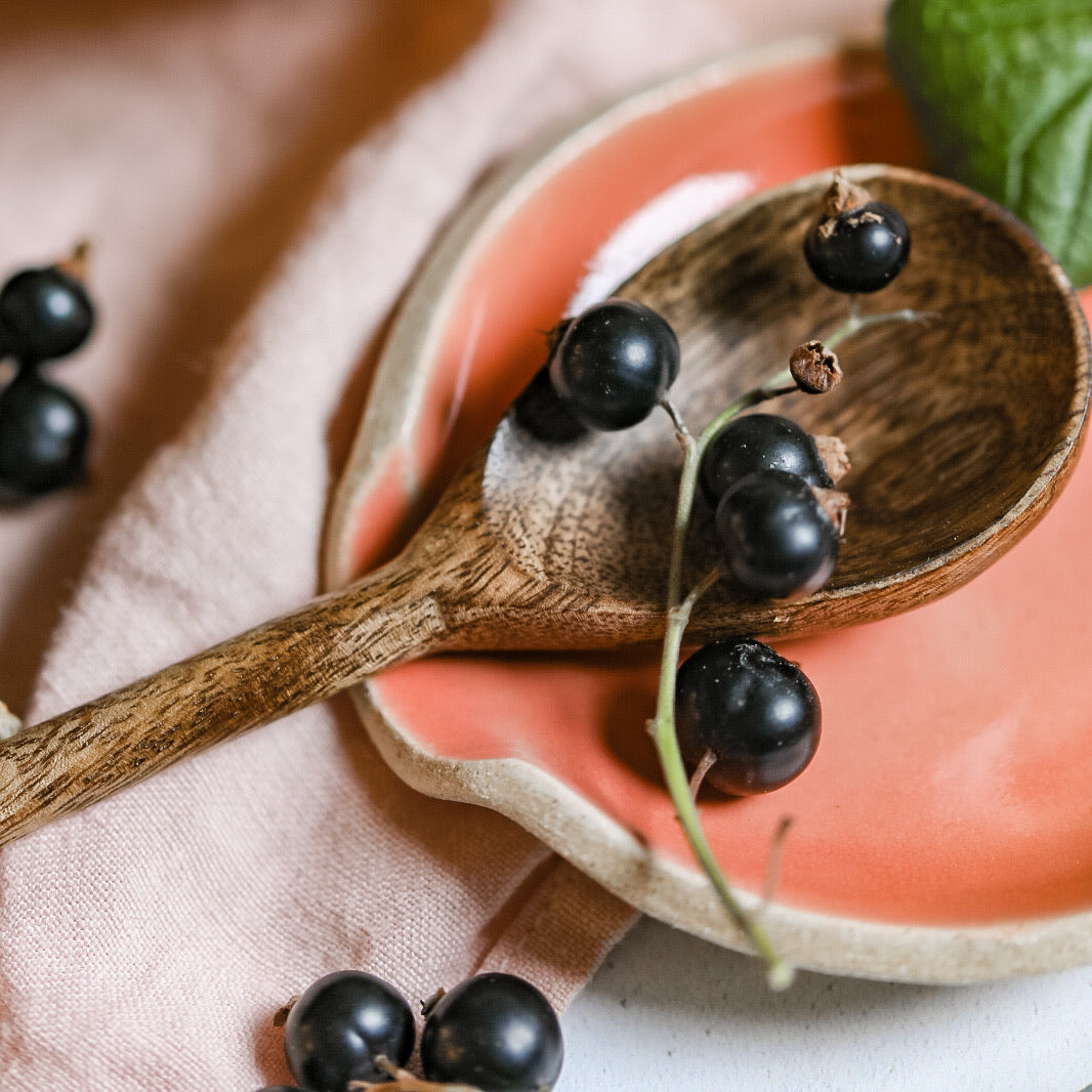 A handmade ceramic spoon rest from the Glosters pottery tableware collection.