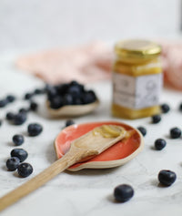 A handmade ceramic spoon rest from the Glosters pottery tableware collection.